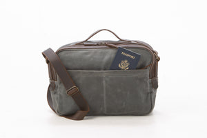 Our William Ross weatherproof travel bag has two back pockets have hidden zippers to hold your passport while waiting in line at the airport. No more holding your passport for two hours while carrying a back pack on your back.