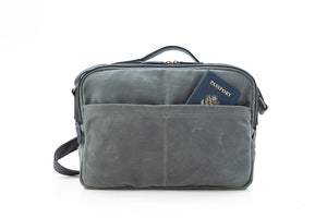 Our William Ross weatherproof crossover travel bag has two back pockets that have hidden zippers to hold your passport while waiting in line at the airport. No more holding your passport for two hours while carrying a back pack on your back.
